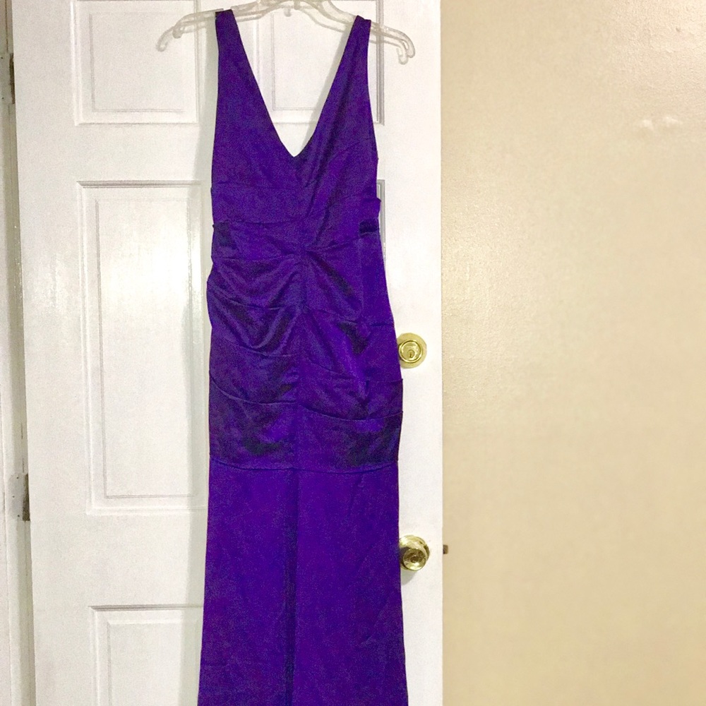 Beautiful purple fitted formal dress.